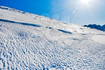 blue cold snow on Alps mountain in Portes du Soleil region, Morzine - Avoriaz, France