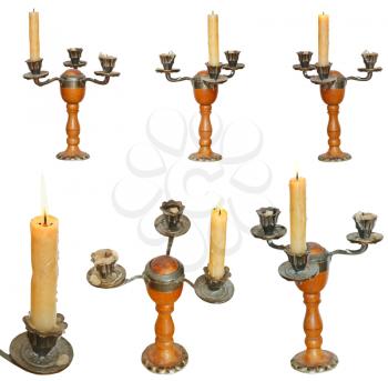 set of candleholder with candles isolated on white background