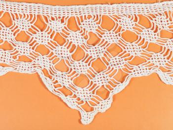 vintage knitting craftsmanship - lace valance embroidered by crochet close up