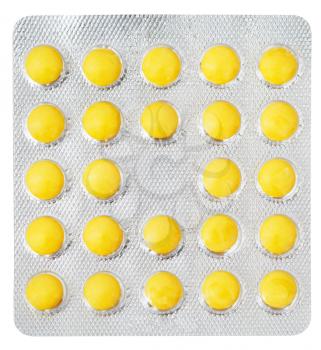 yellow pills in blister pack isolated on white background