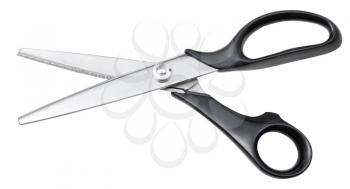 modern pinking scissors with black handles isolated on white background