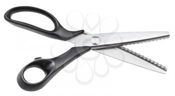 open modern pinking scissors with black handles isolated on white background