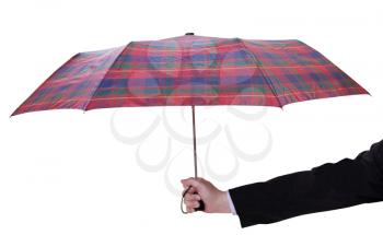 male hand with open checkered umbrella isolated on white background