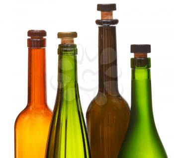 few empty closed wine bottles close up isolated on white background