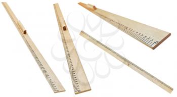 set of wooden meter rulers isolated on white background