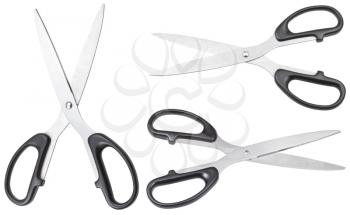 set of standard scissors for paper with black handles isolated on white background
