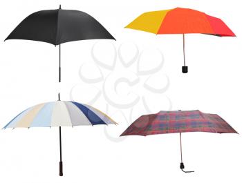 side view of four different open umbrellas isolated on white background