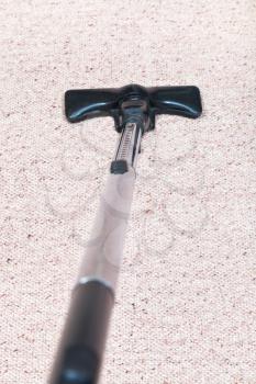 carpeting cleaning with vacuum cleaner at home