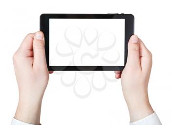 businessman hands holds tablet-pc with cut out screen isolated on white background