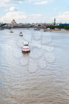 excursion boats in Moskva River near Crimean Bridge, Moscow city, Russia