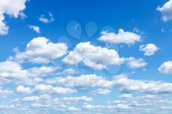 natural background - many white clouds in summer blue sky