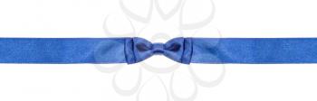 symmetric blue bow knot on narrow silk ribbon isolated on white background