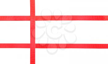 three red satin intersecting ribbons isolated on horizontal white background