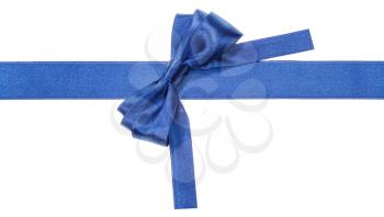 Turned real blue satin bow on narrow ribbon with square cut ends isolated on white background