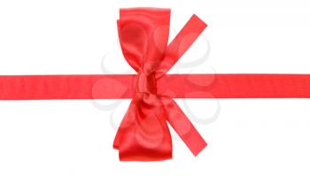 real red satin bow with square cut ends on silk ribbon isolated on white background