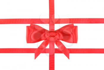 one red satin bow in center and three intersecting ribbons isolated on horizontal white background