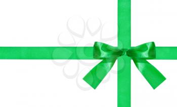 one big green bow-knot on two satin ribbons isolated on white background