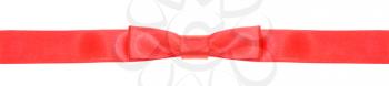 symmetric red bow knot on narrow silk ribbon isolated on white background