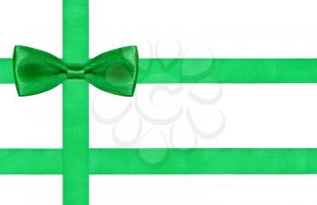one big green bow knot on three satin strips isolated on white background