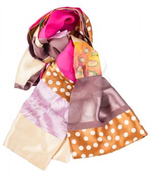 knotted handmade sewing patchwork silk scarf with batik swatch isolated on white background