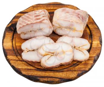 pieces and slices of hot smoked Starry sturgeon and sturgeon fishes on wooden cutting board isolated on white background