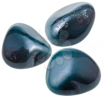 natural mineral gem stone - three heliotrope (bloodstone) gemstones isolated on white background close up