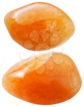 natural mineral gem stone - two red aventurine gemstones isolated on white background close up