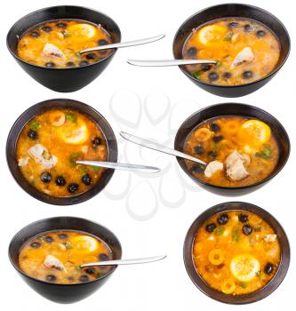 set of bowls with Solyanka russian traditional spicy and sour soup with fish isolated on white background