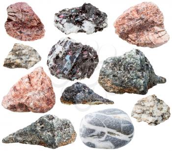macro shooting of collection natural rock - various gneiss mineral stones and rocks isolated on white background