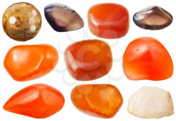 macro shooting of collection natural stones - various chalcedony and carnelian gem stones isolated on white background