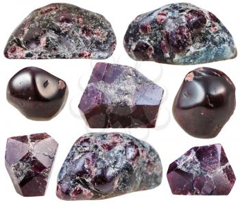 set of natural mineral stones - specimens of garnet (almandine) tumbled gemstones and rocks isolated on white background