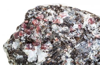 macro shooting of natural rock specimen - Corundum crystals in mineral stone close up isolated on white background