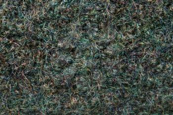textile background - green felted woolen Loden fabric close up