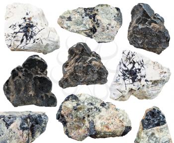 set of various natural mineral stones - black Ilmenite ( titanium-iron oxide, titanium ore) gemstones isolated on white background