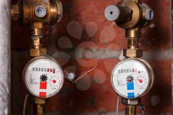 pair new residential water meters on pipes
