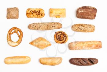 set from various freshly baked buns and loaves on white background
