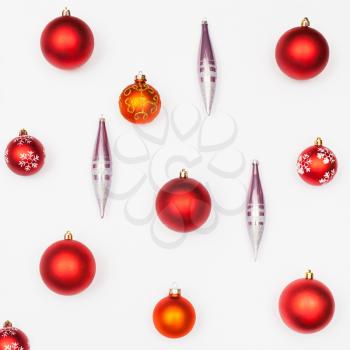 various christmas balls and glass icicles on white background