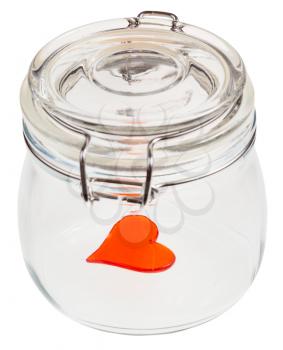 red heart in closed glass jar isolated on white background