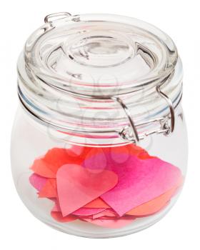 many hearts cut out from paper in closed glass jar isolated on white background
