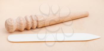 Leather crafting tool - flat and round Edge Slickers and Burnishers on natural leather