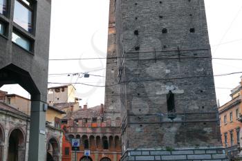 travel to Italy - base of Torre Garisenda (Garisenda tower) and Asinelli tower on the background in Bologna city