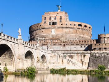 travel to Italy - Castel Sant Angelo (Castle of the Holy Angel, Mausoleum of Hadrian) and bridge of St Angel in Rome city from Tiber river in sunny day