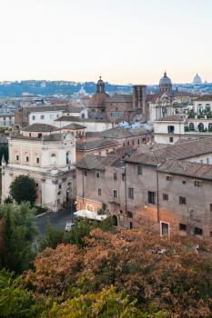 travel to Italy - view of houses of old Rome city from Capitoline hill in evening