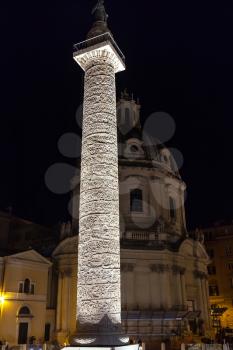 travel to Italy - illuminated Trajan Column, Santissimo Nome di Maria al Foro Traiano Church in ancient roman forums in Rome city in night