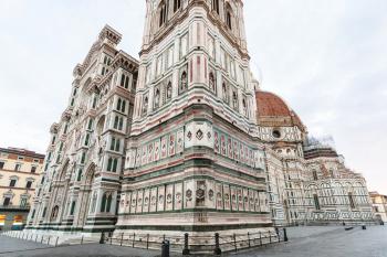 travel to Italy - Giotto's Campanile and Florence Duomo Cathedral (Cattedrale Santa Maria del Fiore, Duomo di Firenze, Cathedral of Saint Mary of the Flowers) on Piazza San Giovanni in morning