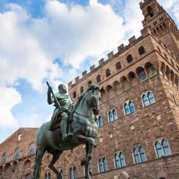 travel to Italy - Equestrian Monument of Cosimo I and wall of Palazzo Vecchio on Piazza della Signoria in Florence city