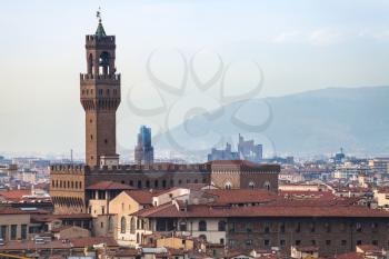 travel to Italy - above view of Palazzo Vecchio in Florence town from Piazzale Michelangelo in autumn evening