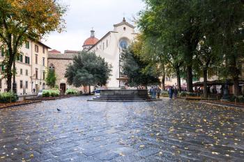 FLORENCE, ITALY - NOVEMBER 5, 2016: Piazza Santo Spirito with Basilica di Santo Spirito in Florence city in autumn. Church was built in the XV century by Filippo Brunelleschi project