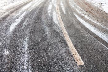 surface of snowy slippery road in winter day