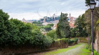Travel to Italy - view of Rome city with monument vittorio emanuele ii on Capitoline hill from Aventine Hill in Rome city in winter